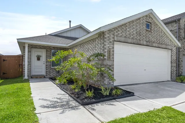 a front view of house with garden