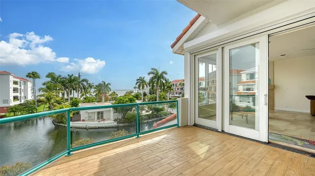 a bathroom with a granite countertop sink mirror and shower