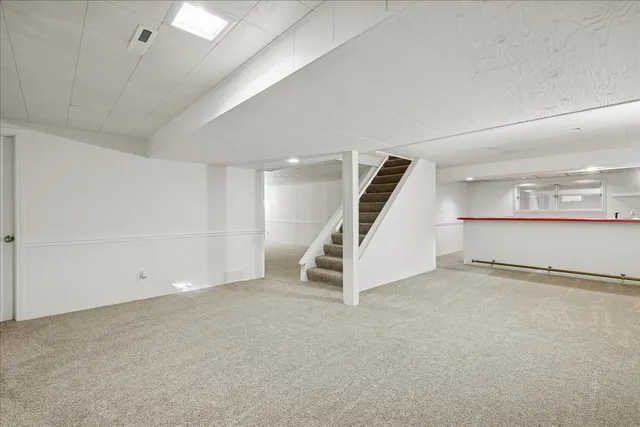 a view of a hallway with a large window