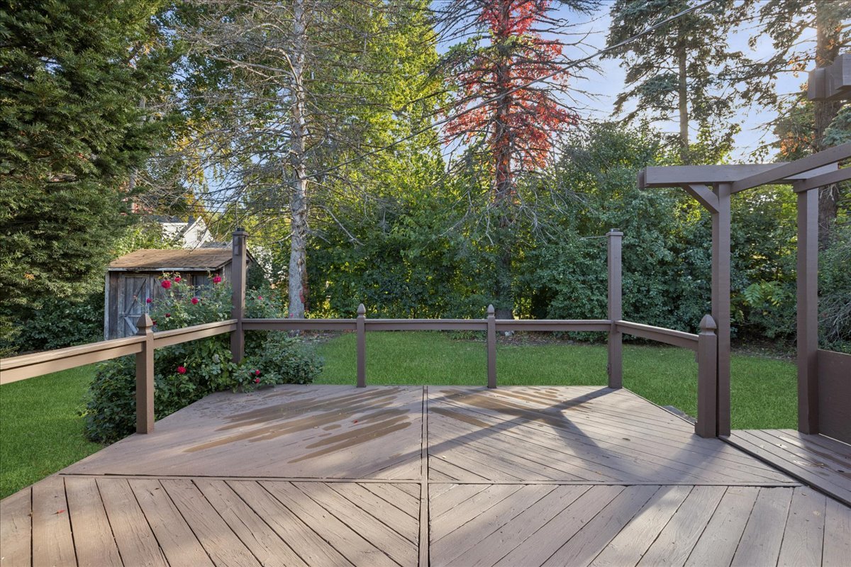 53 North McLean Boulevard Elgin, IL 60123 - Photo 15 of 16 a green field with trees in the background