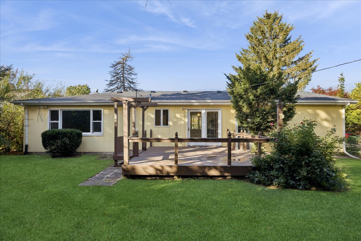 53 North McLean Boulevard Elgin, IL 60123 - Photo 16 of 16 a view of a house with a backyard and a patio