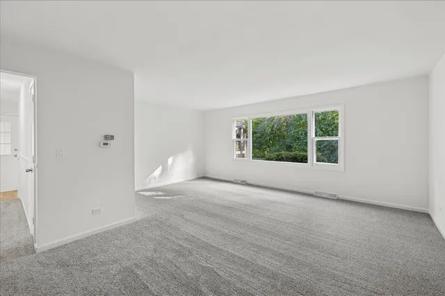 a bathroom with a sink toilet and a mirror