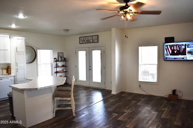 a kitchen with appliances cabinets and a sink