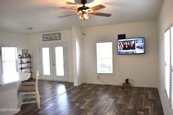 a kitchen with a sink a refrigerator and window