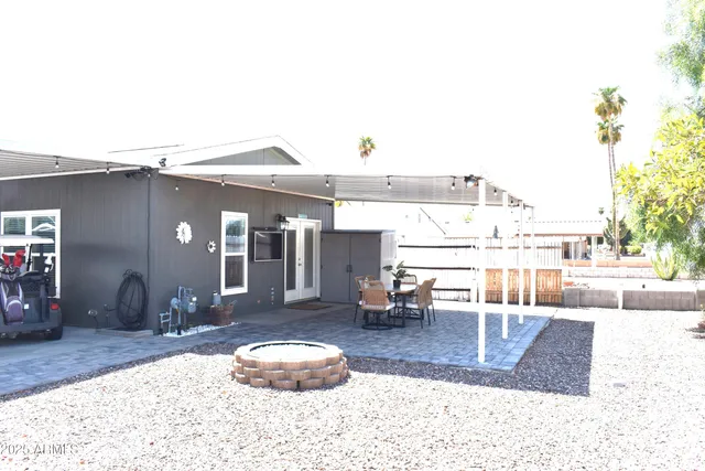 a view of a tables and chairs in patio