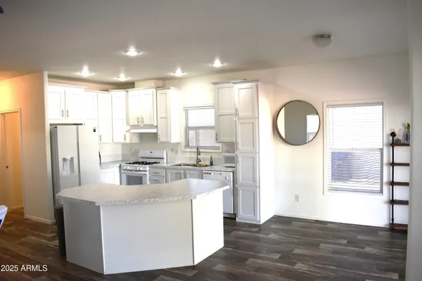 a view of a swimming pool with an outdoor seating