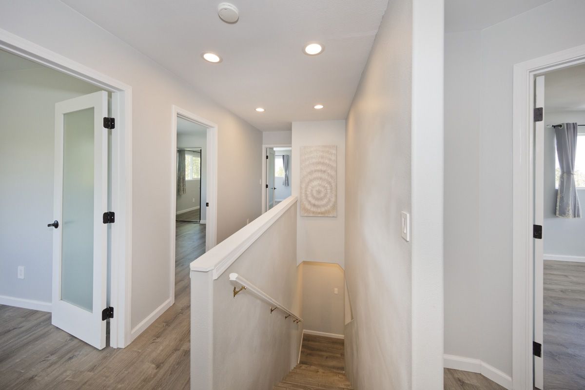 11-2420 Ohialani Road Mountain View, HI 96771 - Photo 17 of 30 a view of a hallway with staircase and stairs