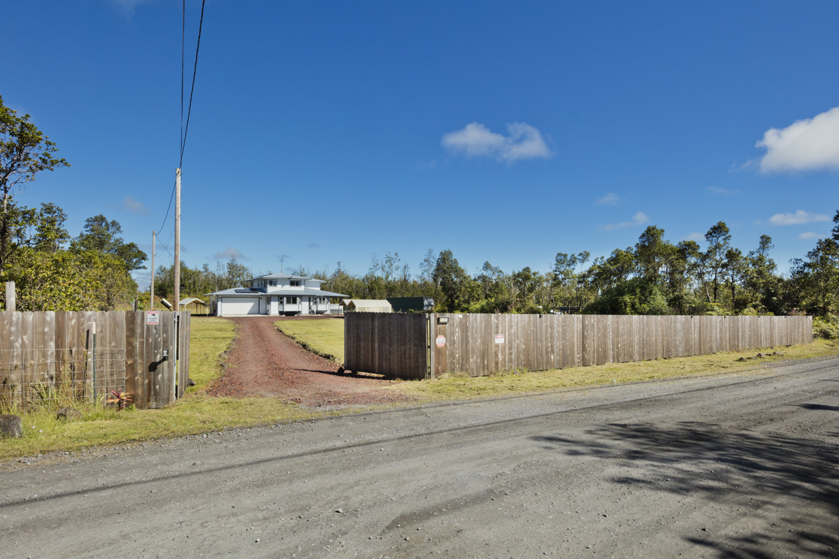 11-2420 Ohialani Road Mountain View, HI 96771 - Photo 2 of 30 a view of a swimming pool with a yard