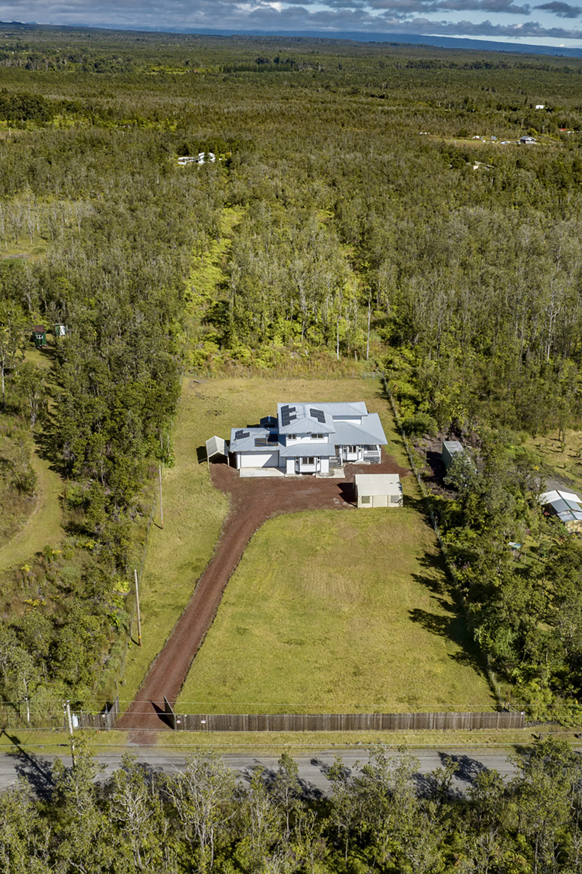 11-2420 Ohialani Road Mountain View, HI 96771 - Photo 28 of 30 a swimming pool with lawn chairs