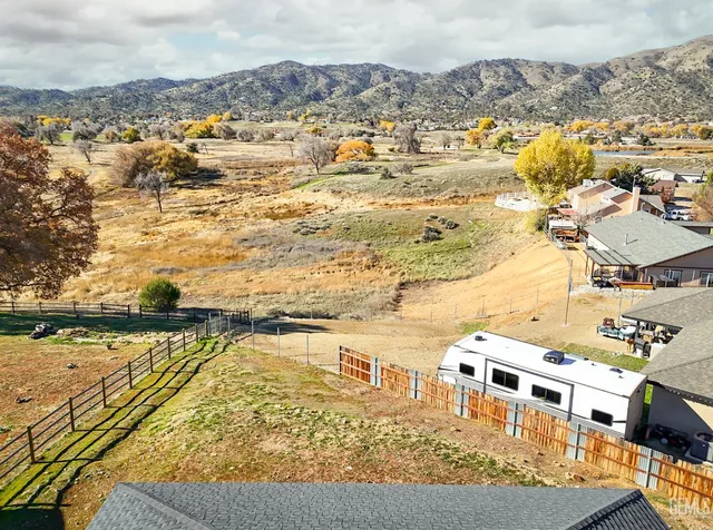 a view of a city with an ocean view