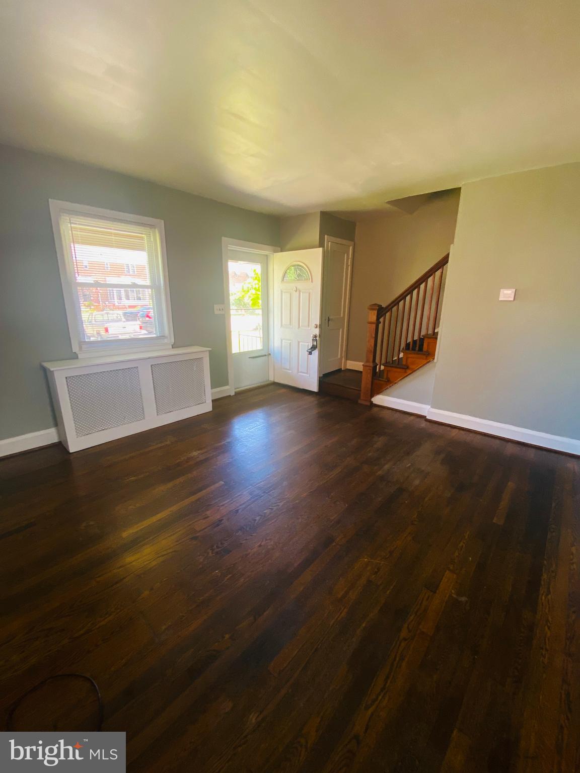 2504 Liberty Parkway Dundalk, MD 21222 - Photo 2 of 21 an empty room with wooden floor and windows