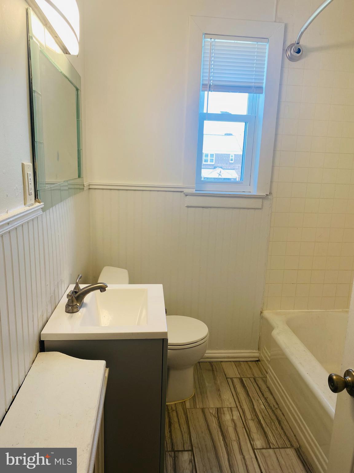 2504 Liberty Parkway Dundalk, MD 21222 - Photo 9 of 21 a bathroom with a sink and a toilet