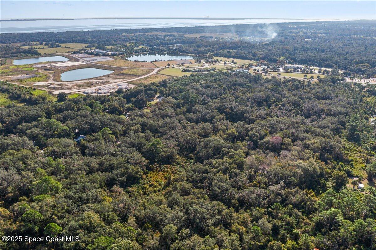 0 Off Seminole Street Mims, FL 00000 - Photo 3 of 8 a view of an ocean and a mountain