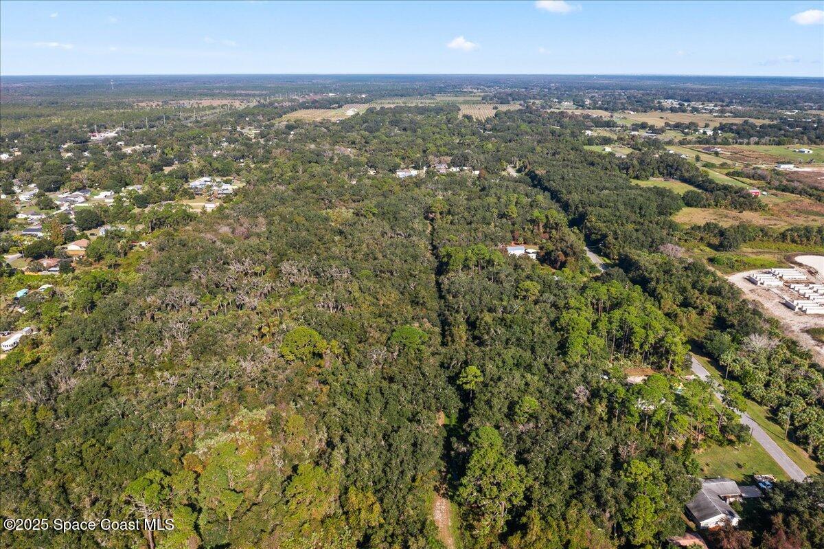 0 Off Seminole Street Mims, FL 00000 - Photo 6 of 8 an aerial view of residential houses with city view