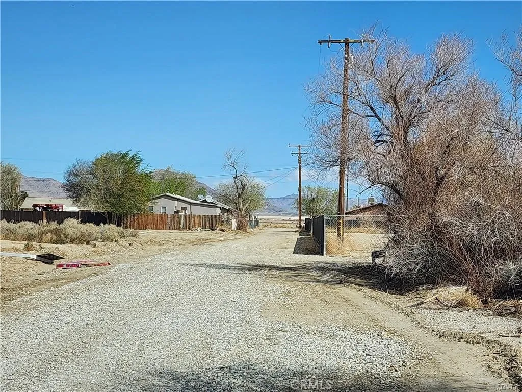 401 Ox Bow Road Lucerne Valley, CA 92356 - Photo 2 of 2 a row of houses with a outdoor space