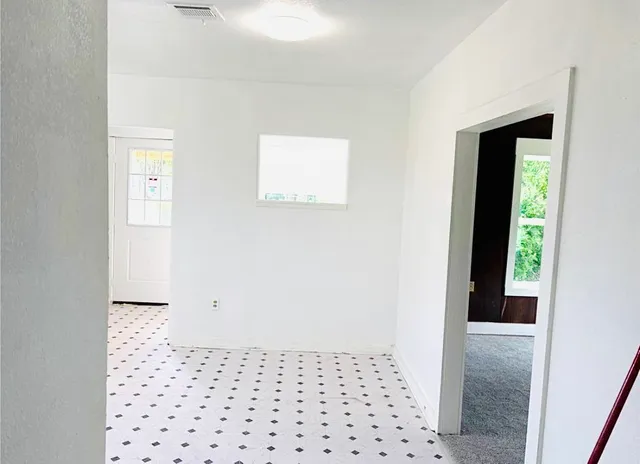 a bathroom with a sink and a shower