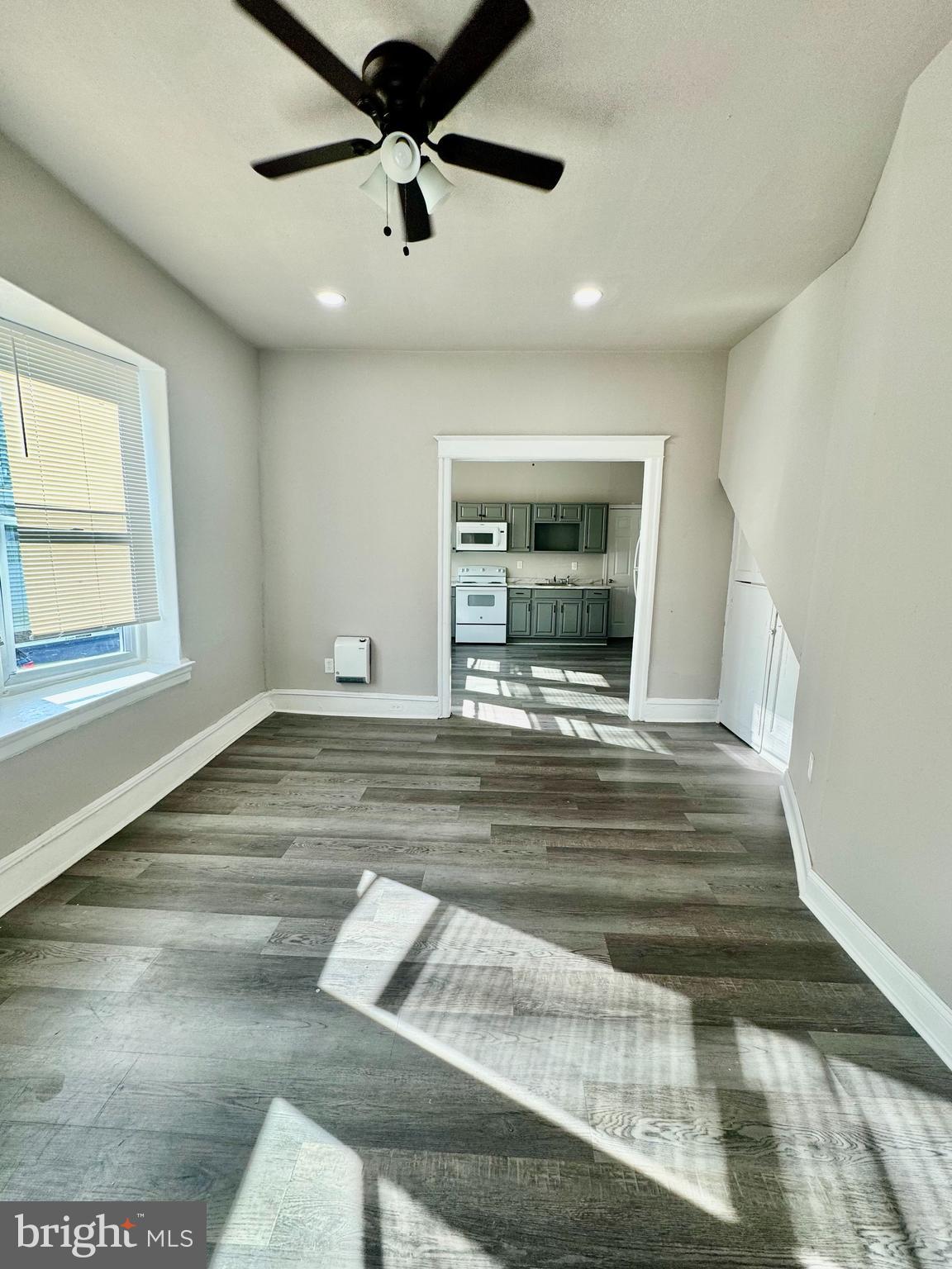 4818 North 13th Street, Unit 1 Philadelphia, PA 19141 - Photo 1 of 12 a view of dining room and wooden floor