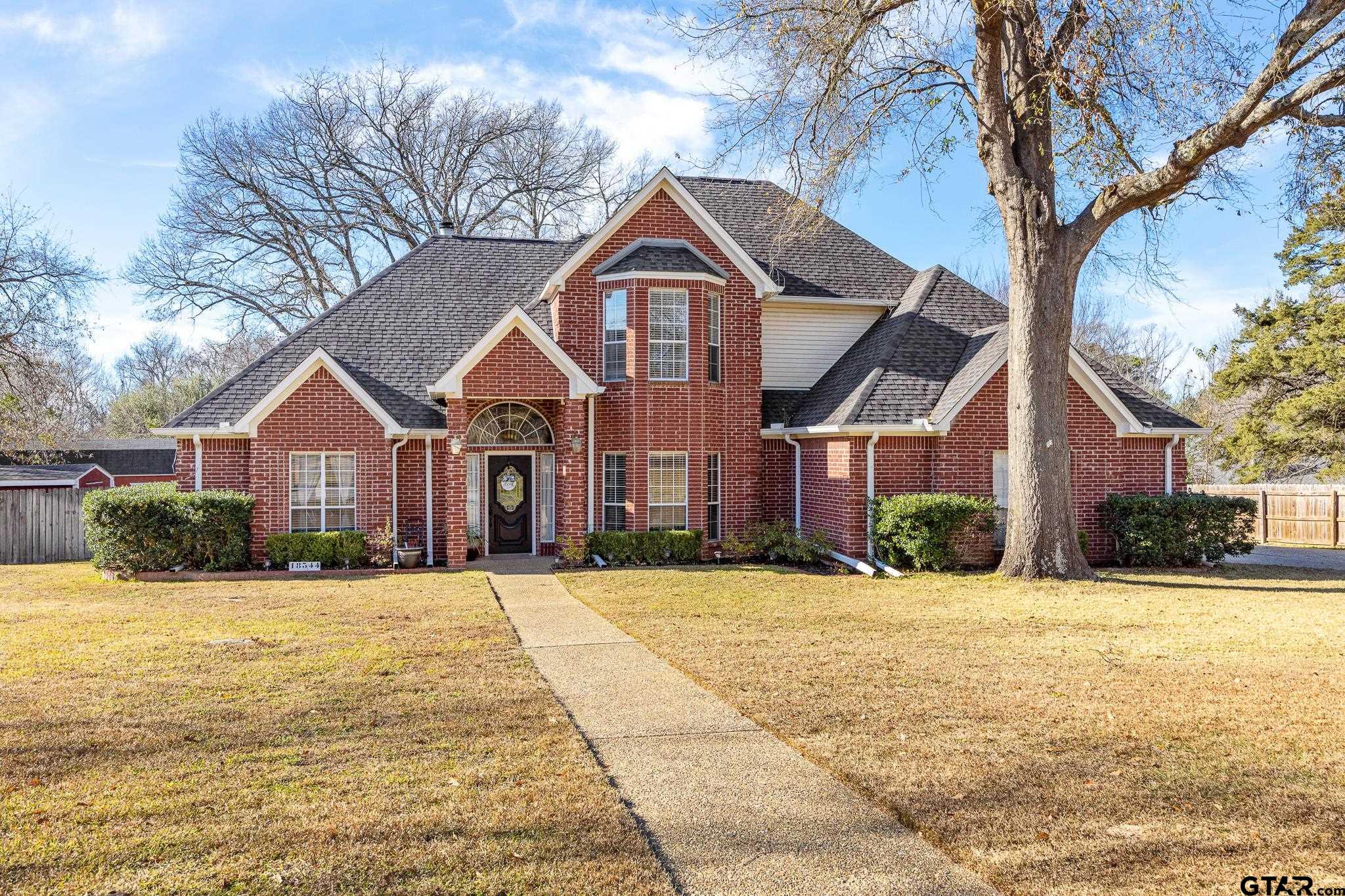 18344 Springmill Court Flint, TX 75762 - Photo 2 of 45 a front view of a house with a yard
