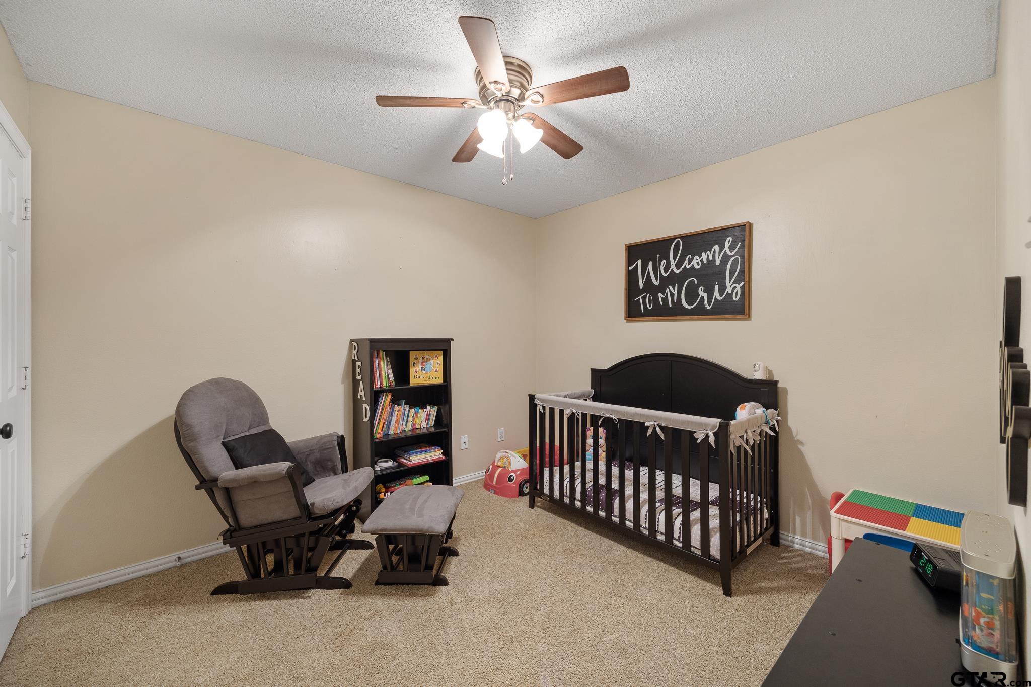 18344 Springmill Court Flint, TX 75762 - Photo 30 of 45 a bedroom with furniture and a window