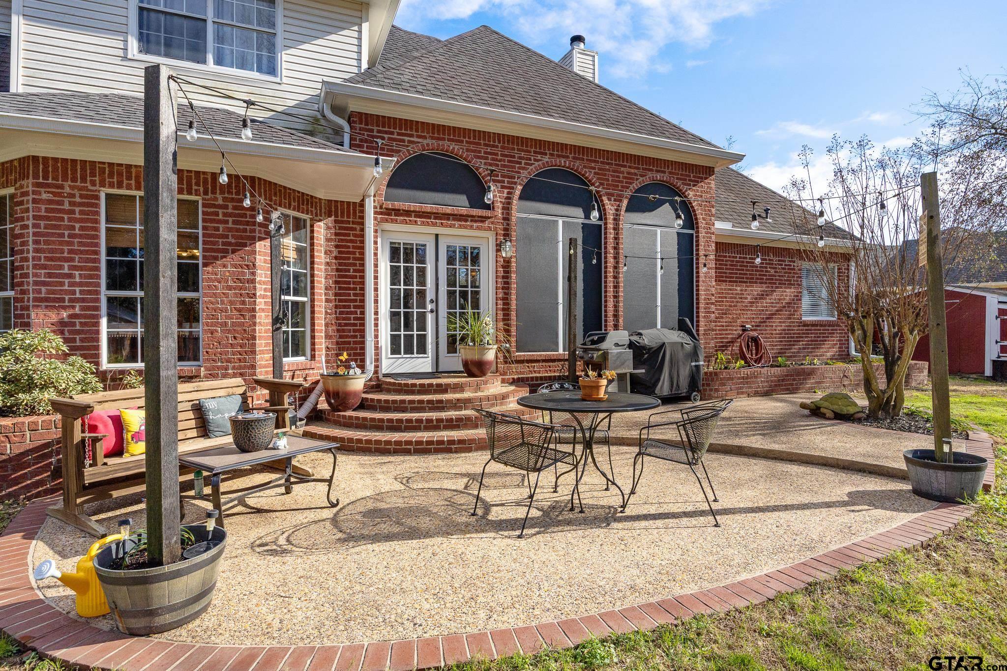 18344 Springmill Court Flint, TX 75762 - Photo 34 of 45 a view of house with outdoor seating space