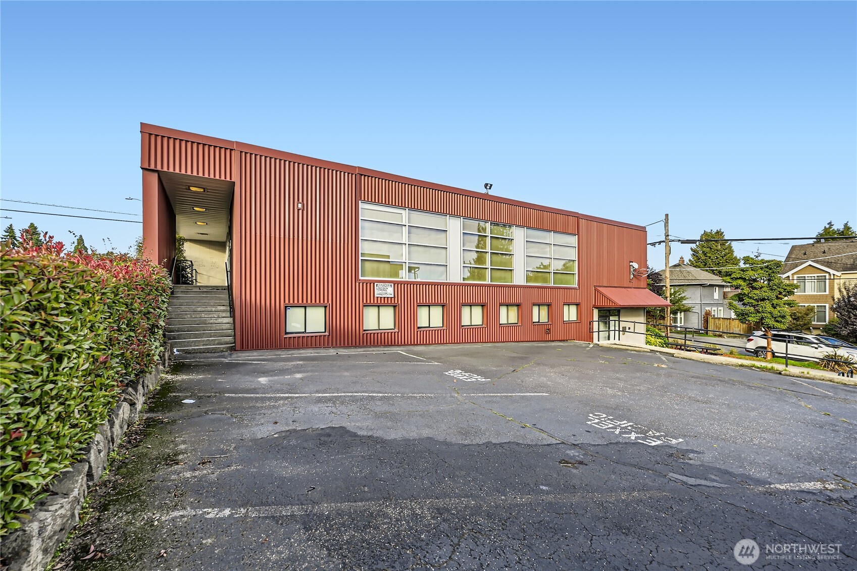 a front view of a house with outdoor space and garage