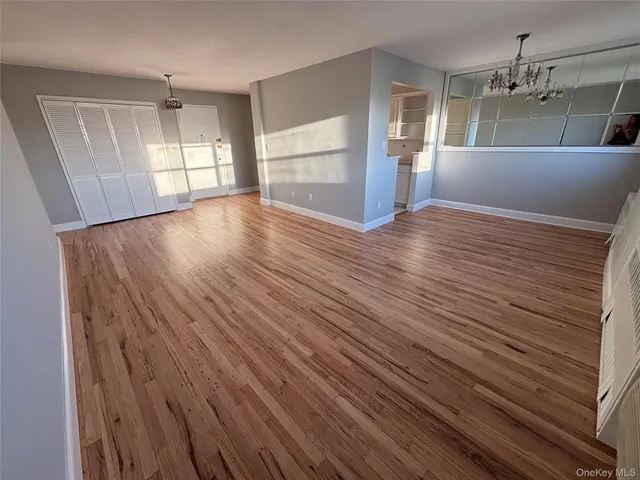a view of a kitchen from the hallway