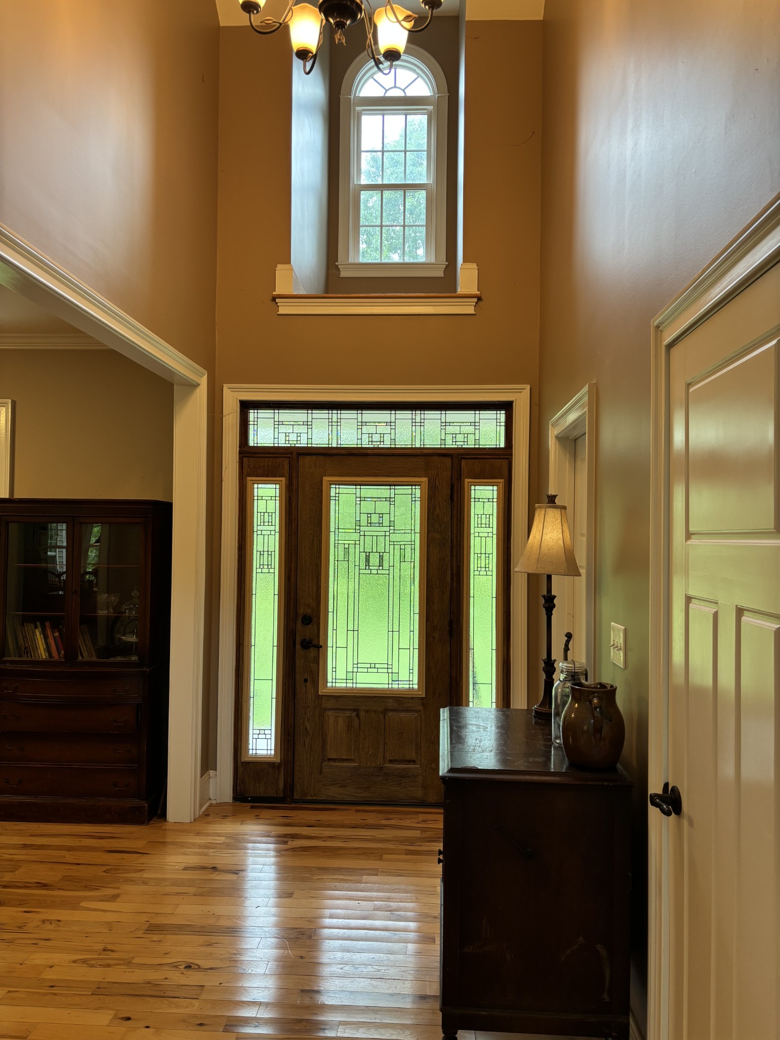 204 Revilo Road Leoma, TN 38468 - Photo 6 of 19 a view of a hallway with wooden floor windows and livingroom