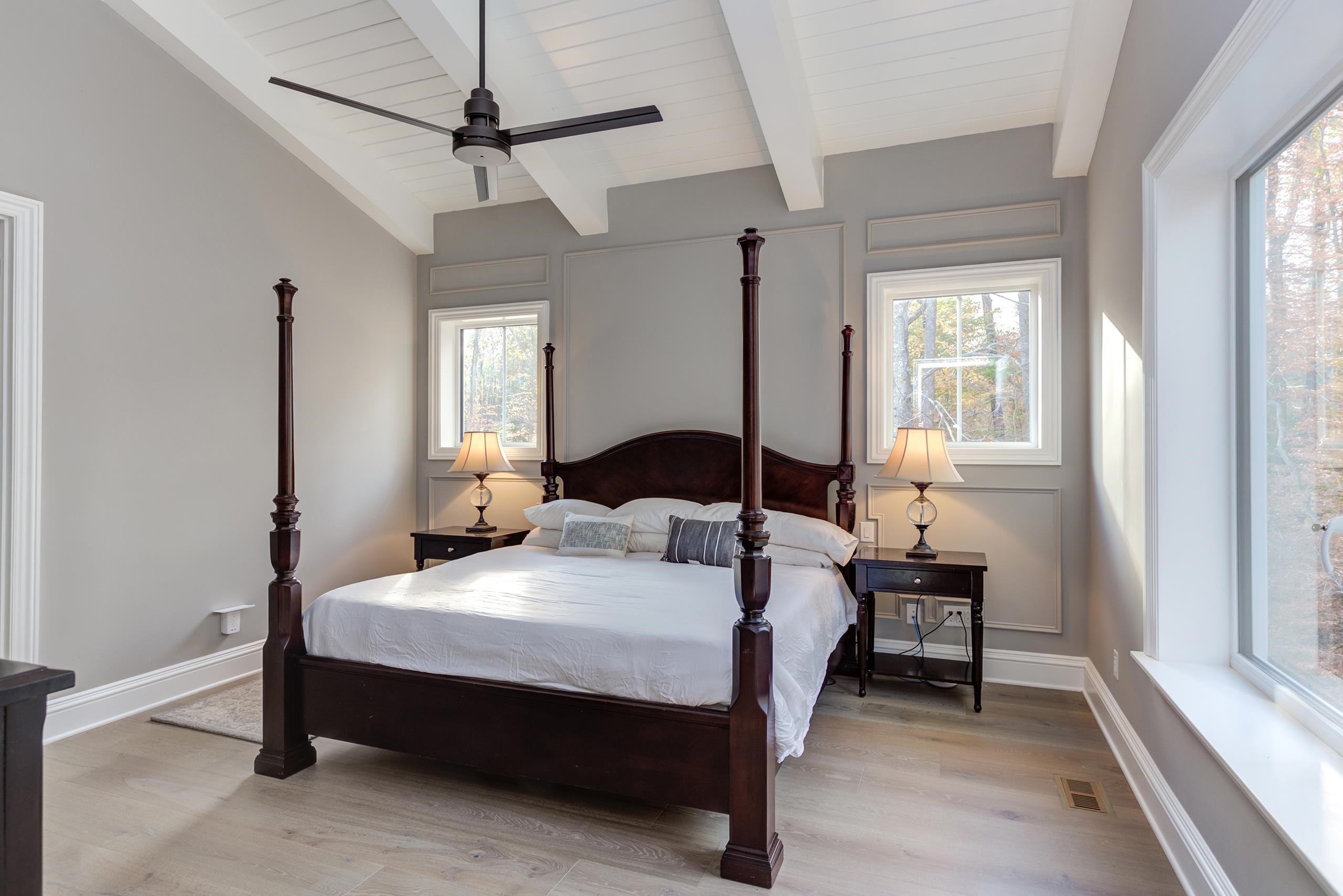 8009 Ghost Pony Trail Raleigh, NC 27613 - Photo 20 of 55 Hardwood Floors, Vaulted Ceiling with Beams, Tons of Natural Light & Overlooks Wooded Backyard! Primary Bedroom
