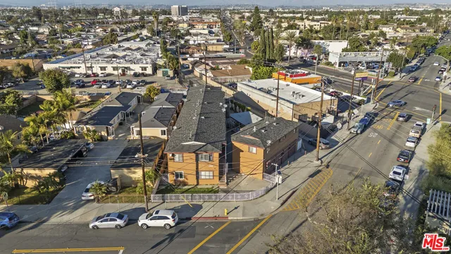 an aerial view of a city with lots of residential buildings