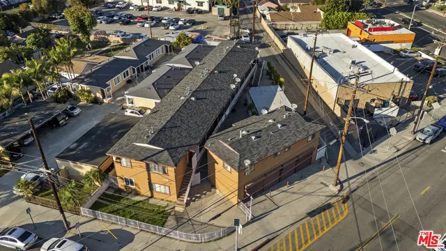 an aerial view of a city with lots of residential buildings