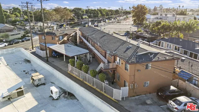 a view of a balcony with chairs and a table