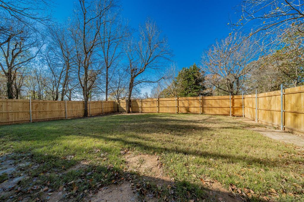 373 5th Street Northwest Paris, TX 75460 - Photo 15 of 16 a view of yard with tree