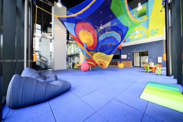 1010 Brickell Avenue, Unit 1510 Miami, FL 33131 - Photo 14 of 32 a view of a room with gym equipment