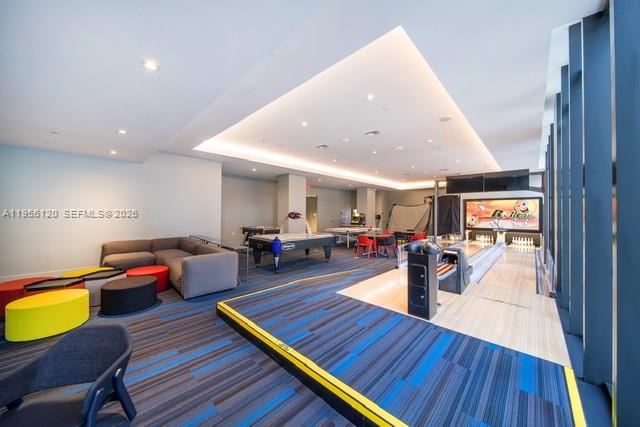 1010 Brickell Avenue, Unit 1510 Miami, FL 33131 - Photo 23 of 32 a living room with furniture and wooden floor
