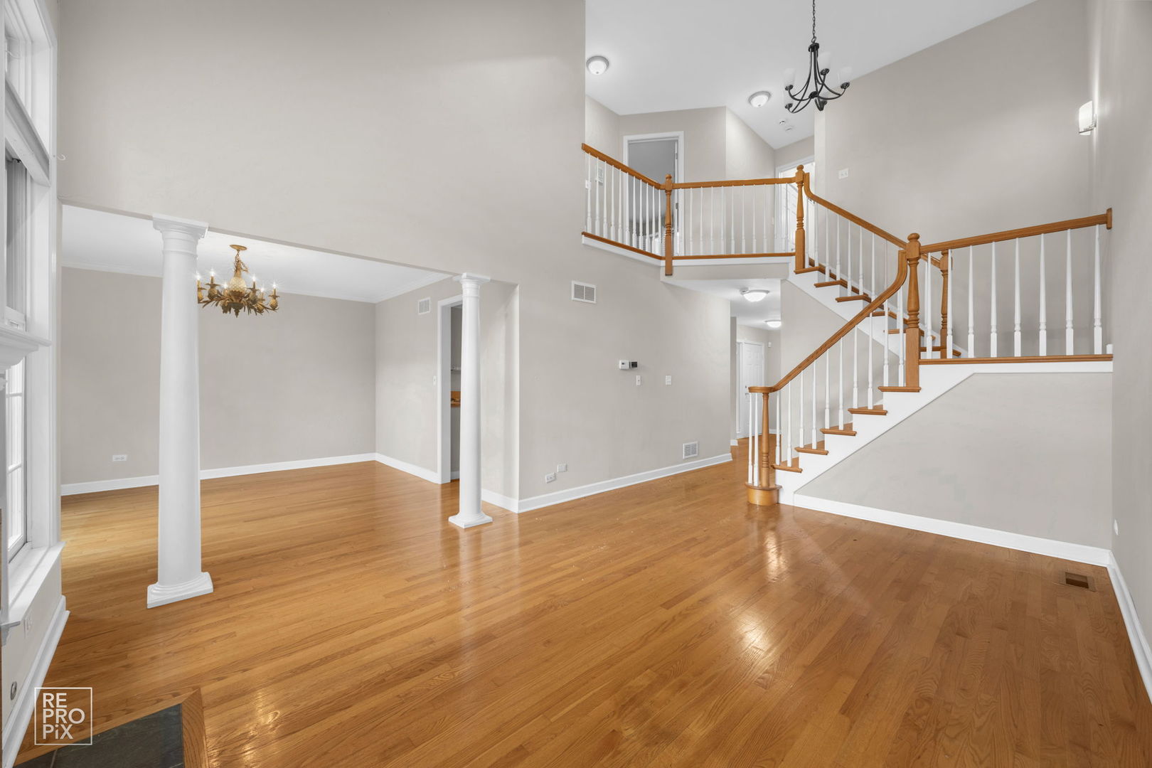 536 West Evergreen Street Wheaton, IL 60187 - Photo 4 of 17 a view of a room with wooden floor and staircase