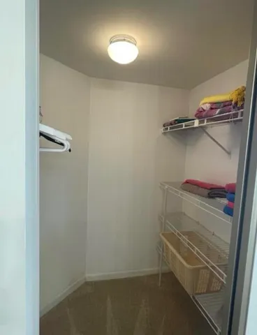 view of a room with racks on the wall