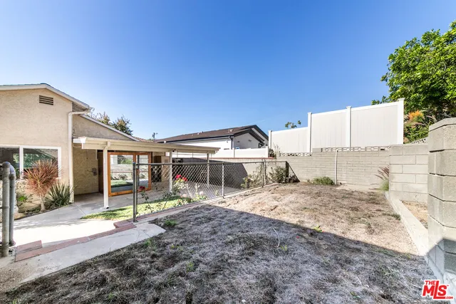 a view of a house with a patio