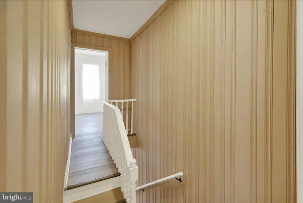 a view of hallway with stairs