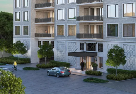 a car parked in front of a brick house