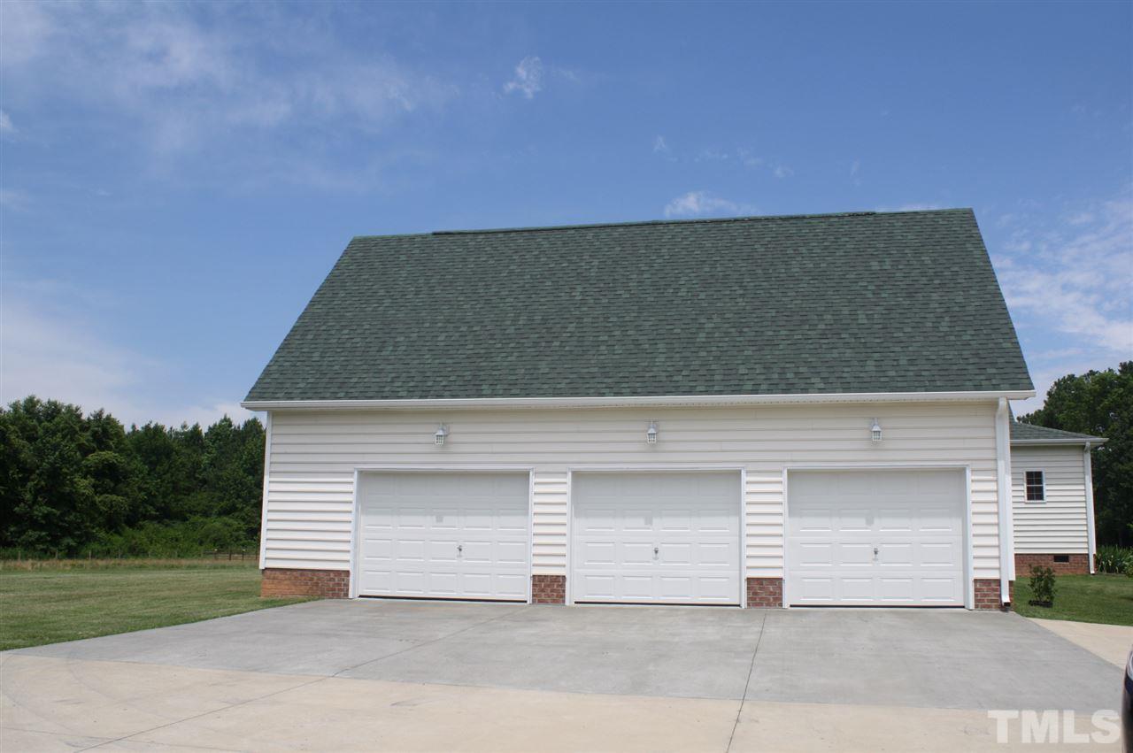 385 Huford Harris Road Spring Hope, NC 27882 - Photo 18 of 25 This over-sized 3-car garage is the perfect place for storing multiple vehicles and lawn equipment and includes an RV hook-up. The large walk-up storage area could be finished out for additional living space or a man cave. Options are endless!
