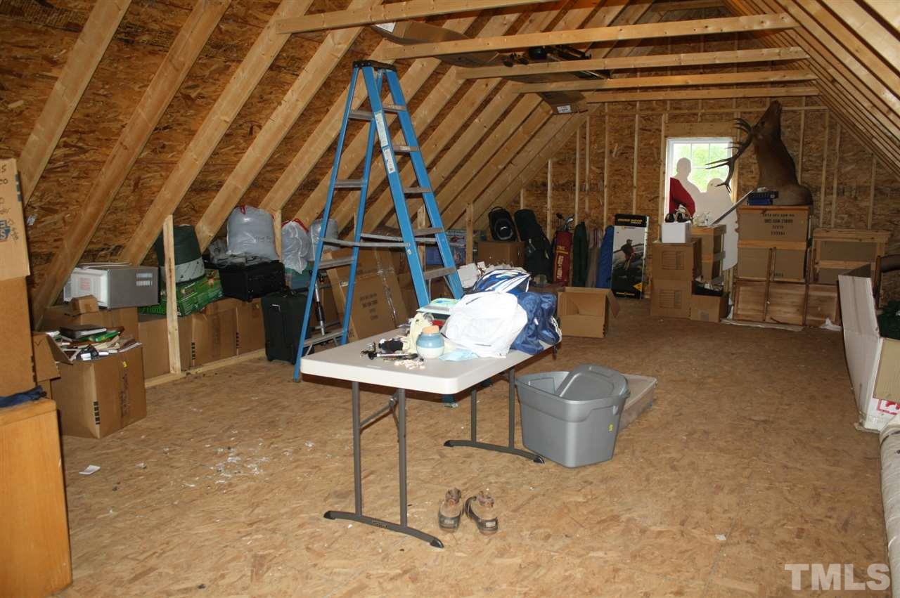 385 Huford Harris Road Spring Hope, NC 27882 - Photo 19 of 25 This large storage area above the garage provides many options for its usage. Room could be finished to provide additional living space.
