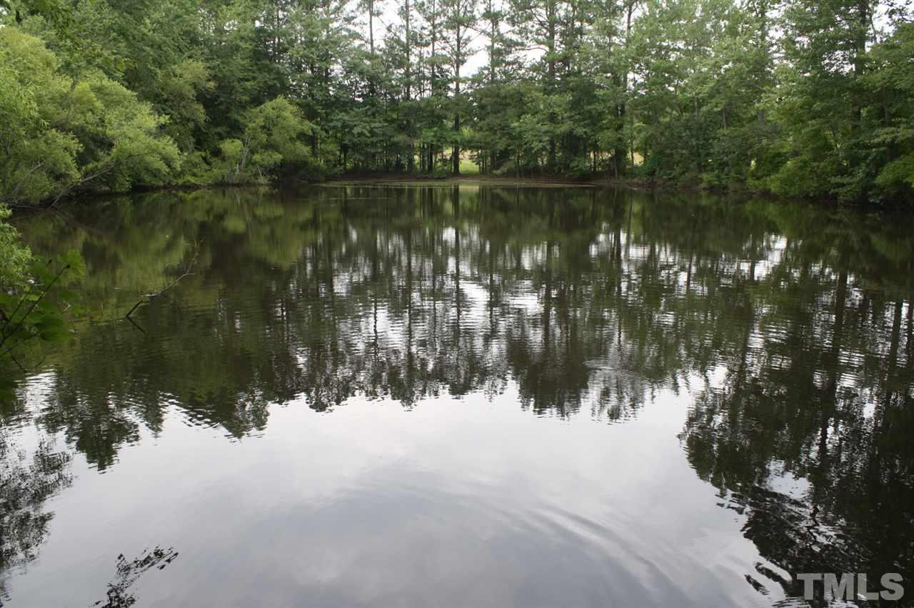 385 Huford Harris Road Spring Hope, NC 27882 - Photo 25 of 25 You will enjoy the peaceful setting by this lovely pond which is stocked with fish such as brim, bass and catfish.