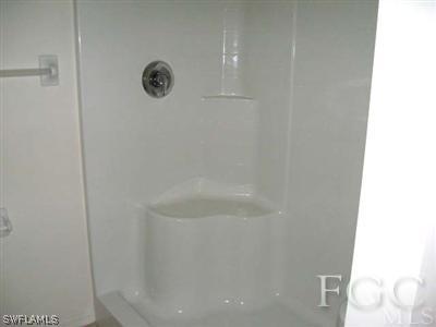 2312 Park Road Lehigh Acres, FL 33971 - Photo 7 of 10 a bathroom with a shower