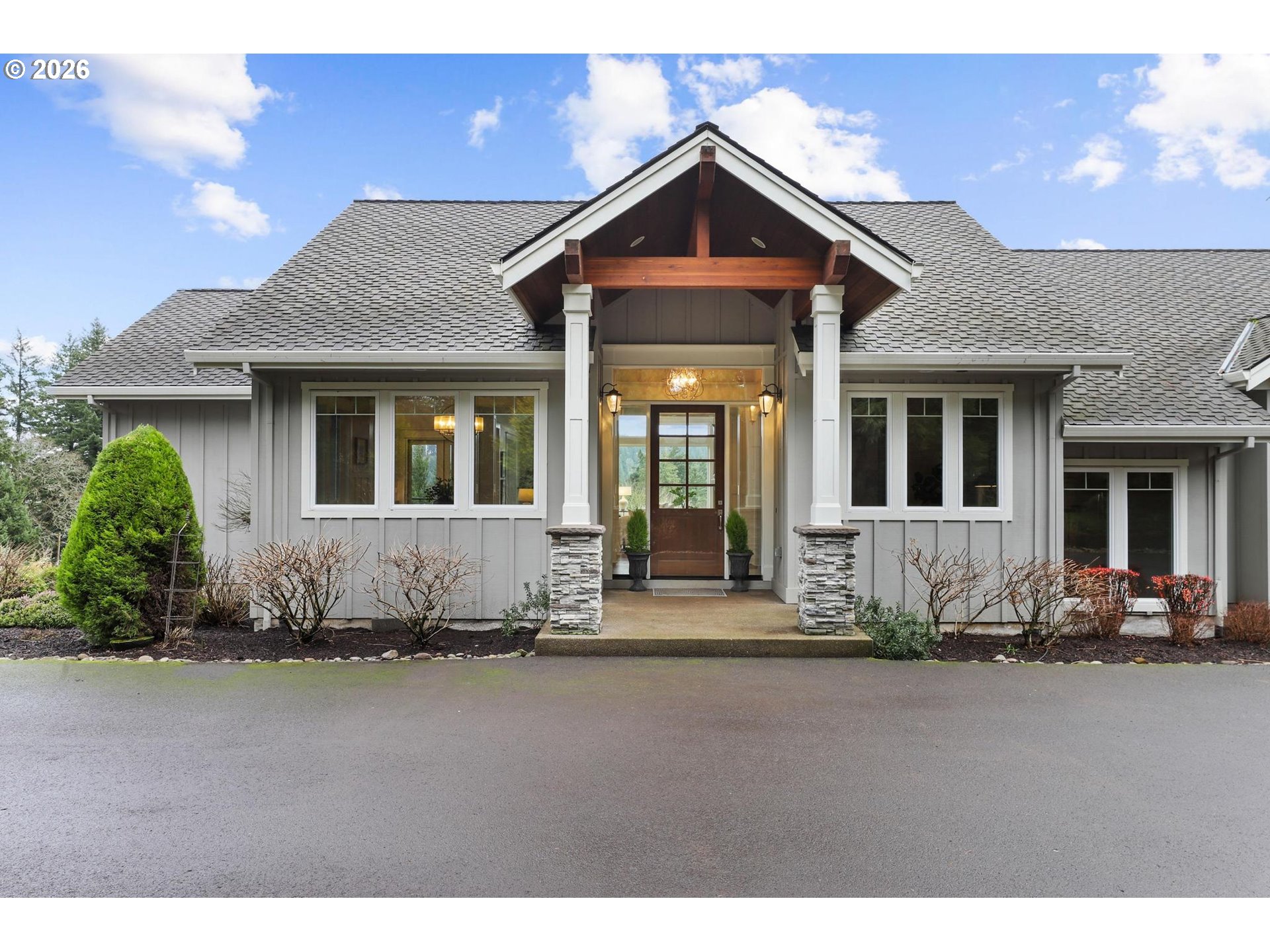 a front view of a house with a yard