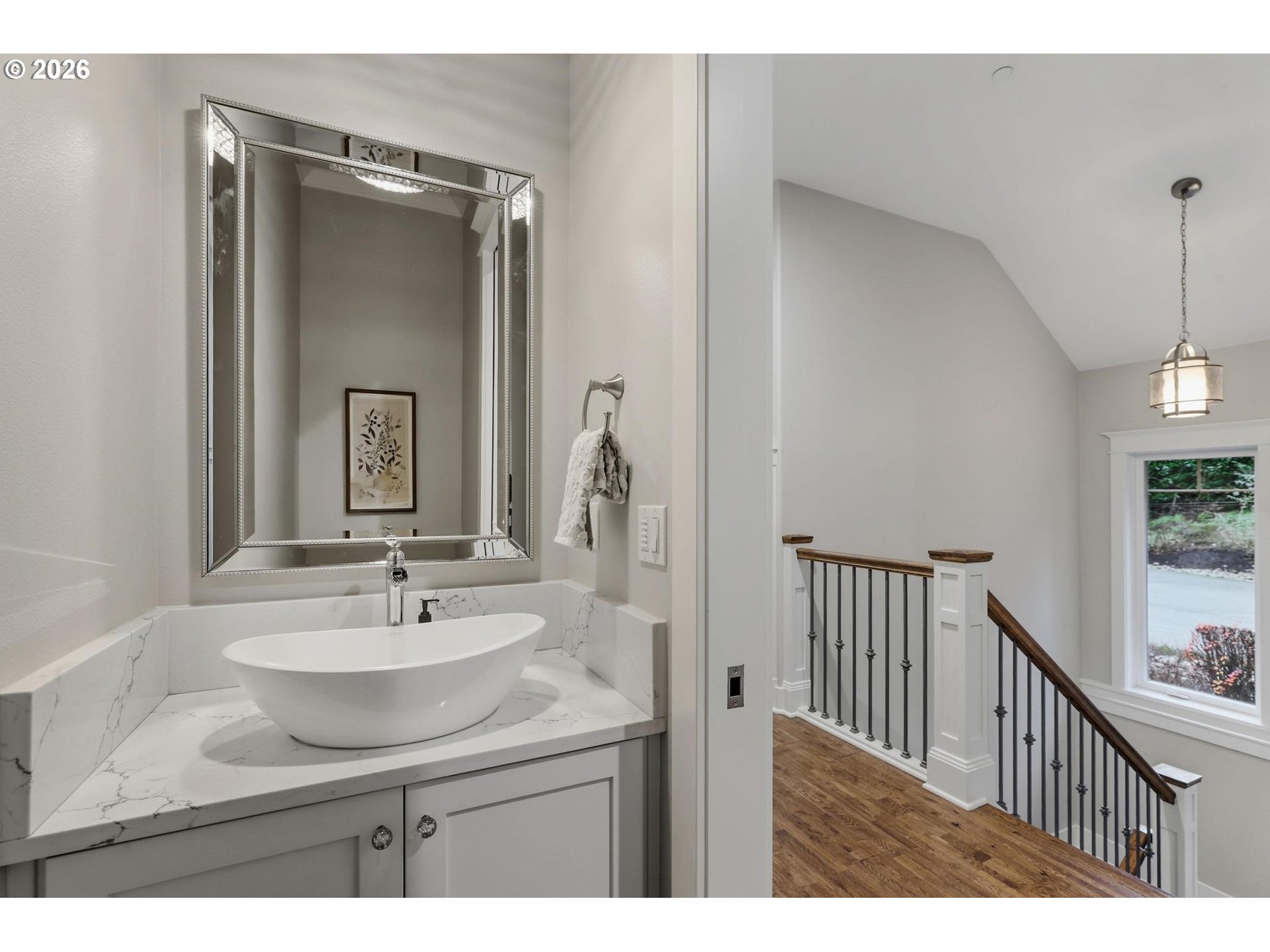23875 Southwest Newland Road Wilsonville, OR 97070 - Photo 16 of 40 a bathroom with a sink and a mirror