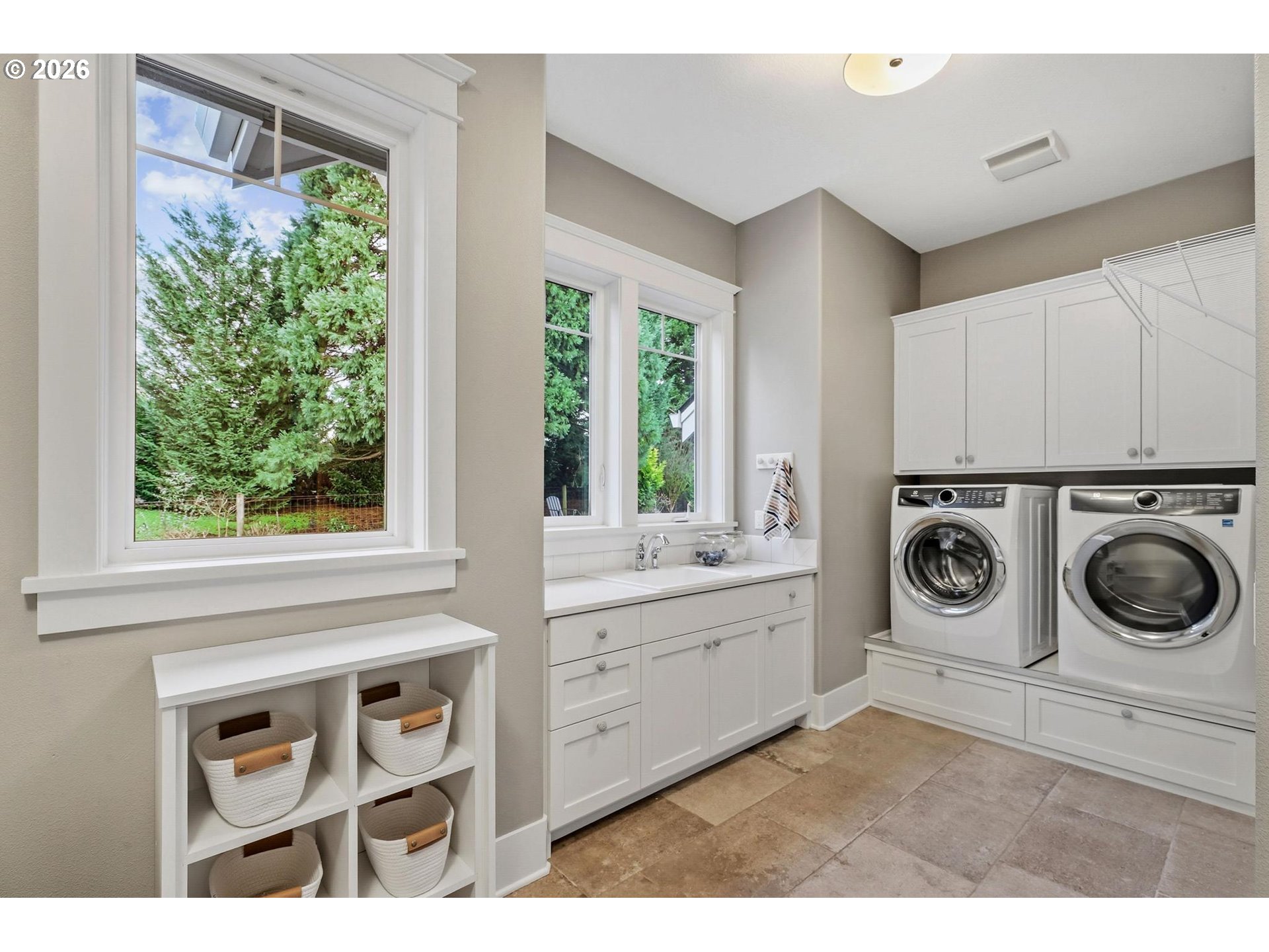 23875 Southwest Newland Road Wilsonville, OR 97070 - Photo 24 of 40 a utility room with sink dryer and washer