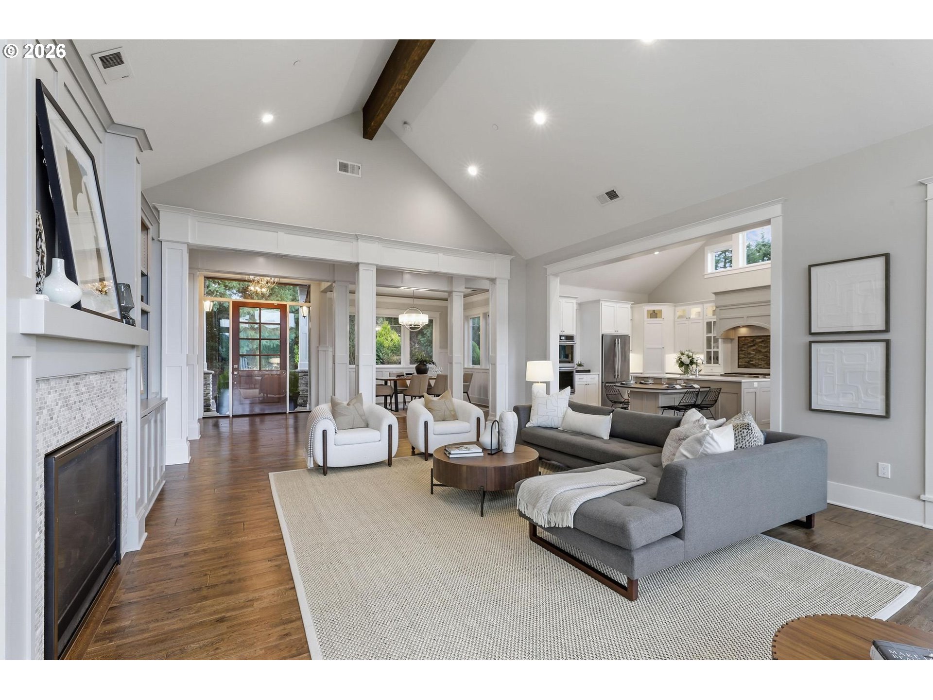 23875 Southwest Newland Road Wilsonville, OR 97070 - Photo 4 of 40 a living room with furniture and a fireplace