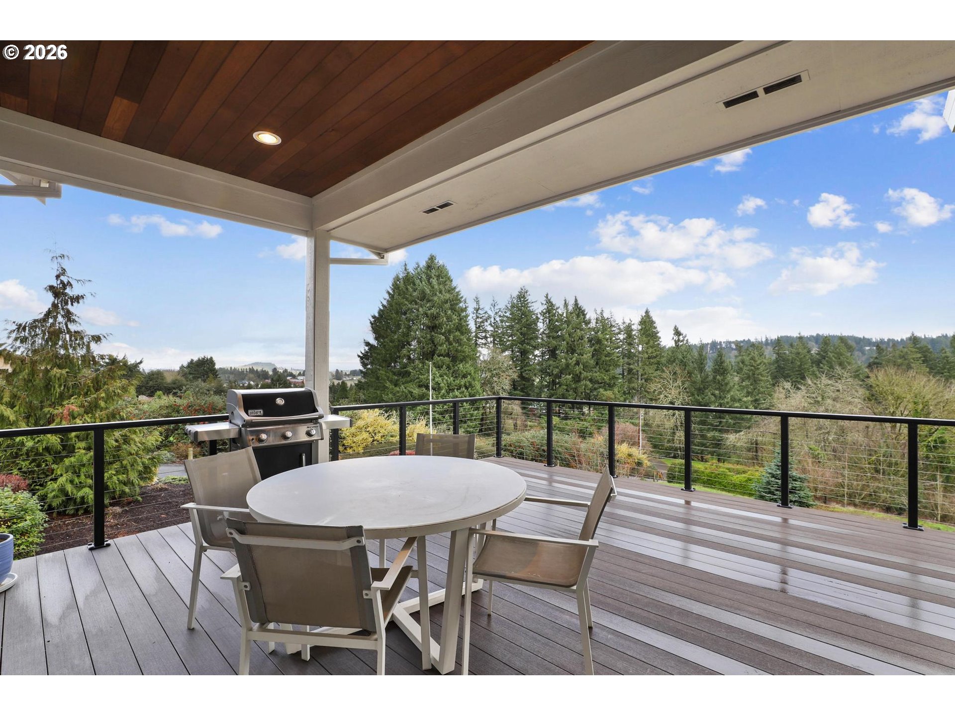 23875 Southwest Newland Road Wilsonville, OR 97070 - Photo 7 of 40 a view of a chairs and table in the balcony