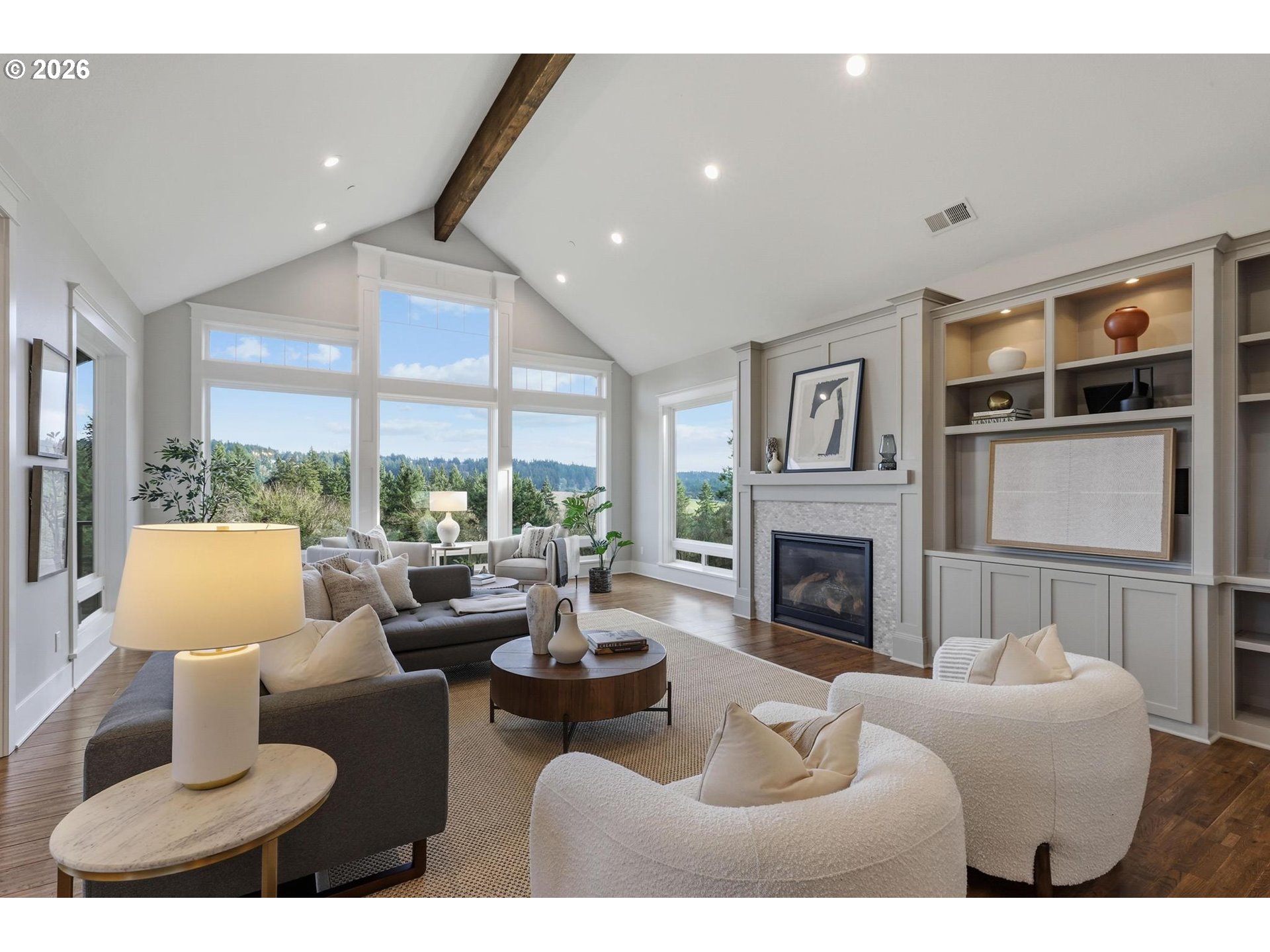 23875 Southwest Newland Road Wilsonville, OR 97070 - Photo 8 of 40 a living room with fireplace furniture and a large window