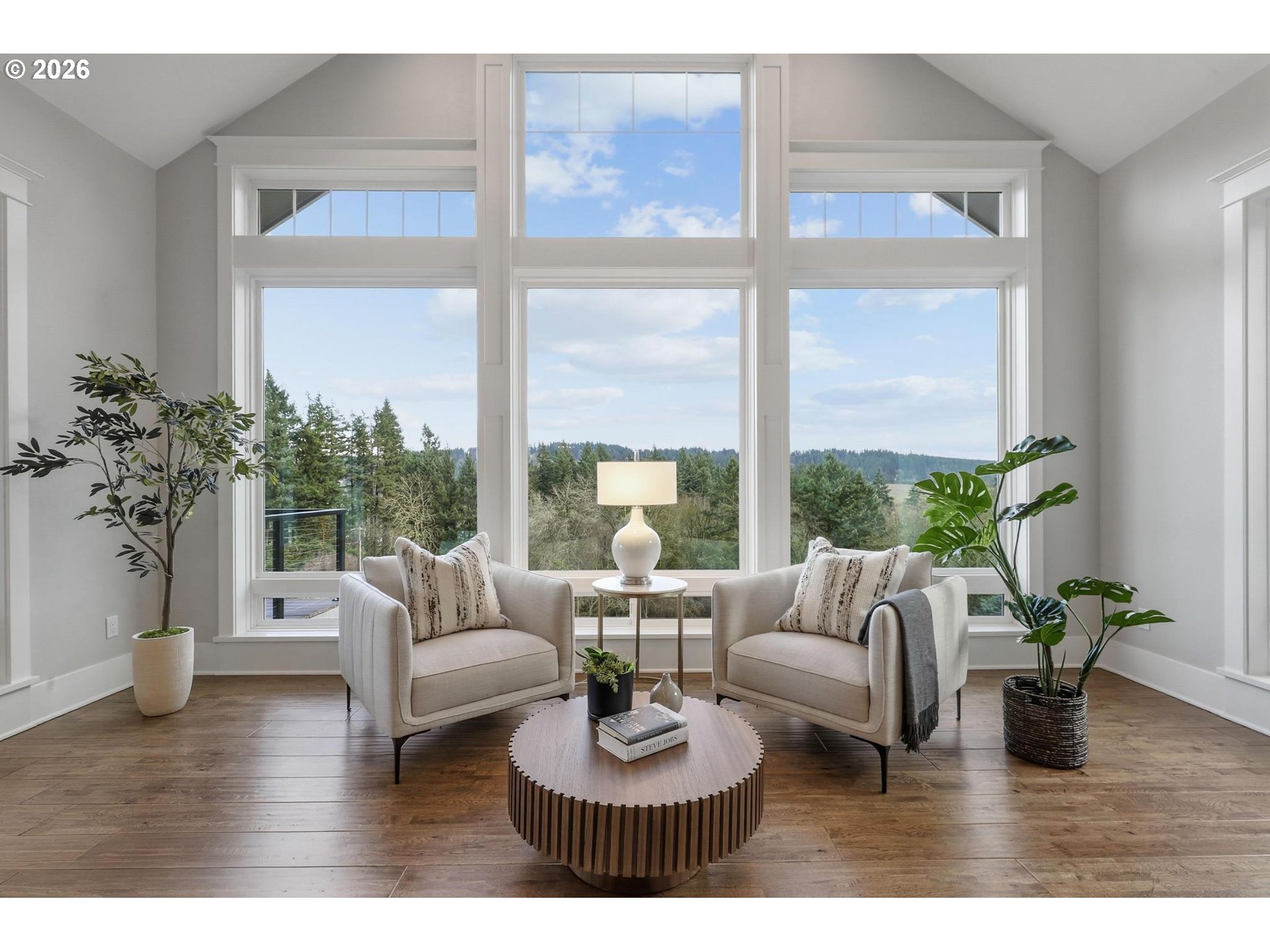 23875 Southwest Newland Road Wilsonville, OR 97070 - Photo 9 of 40 a living room with furniture and a large window